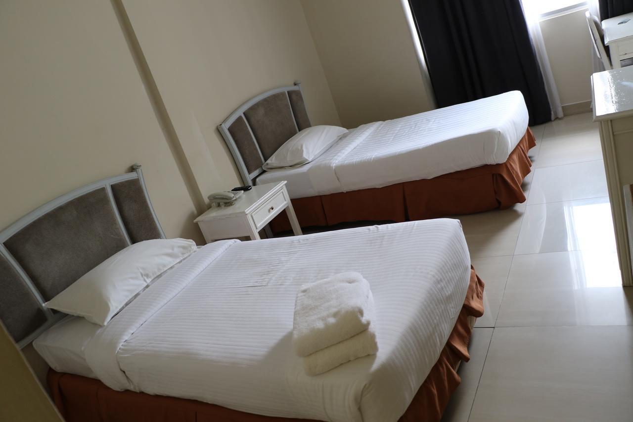 Legallery Suites Hotel Бандар-Сери-Бегаван Экстерьер фото